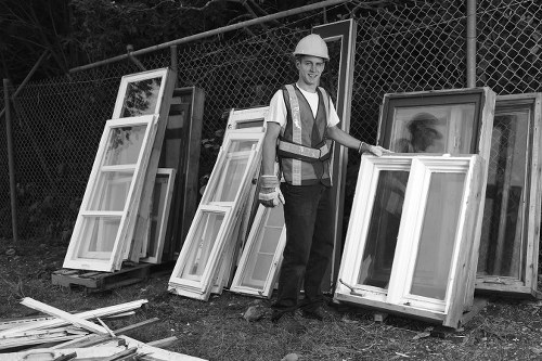 Furniture clearance team removing couches from a home in Chiswick